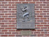 Daniel Mendoza plaque, now located on the outside wall of Queen Mary's College