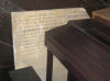 Memorila plaque to Barnett Abrahams.  The first line is: 'This tablet is erected by the working classes of the Jewish faith to honor (note the USA spelling!) the memory of the Reverend Barnett Abrahams, founder of the Association for the diffusion of Jewish Knowledge'