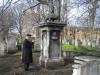 Reading Mrs Levy's memorial insciption, Brady Street Cemetery