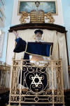 Rabbi Dr Jonathan Sacks addressing Kehillas Ya'akov  standing in front of the ark