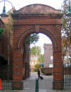 Four Per Cent Industrial Dwellings Company comemoration arch dated 1886, Wentworth Street